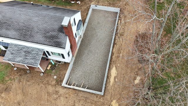 Completed monolithic poured concrete residential foundation